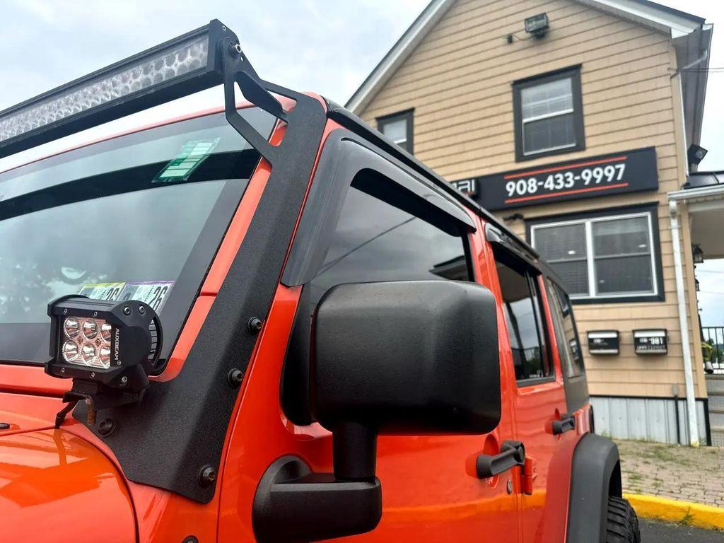 used 2015 Jeep Wrangler Unlimited car, priced at $12,990
