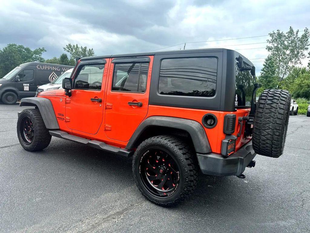 used 2015 Jeep Wrangler Unlimited car, priced at $12,990