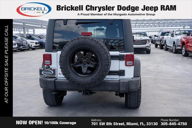 used 2014 Jeep Wrangler Unlimited car, priced at $16,202
