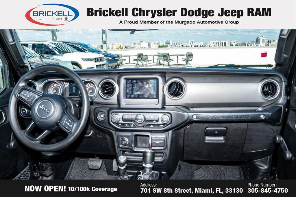 used 2023 Jeep Wrangler car, priced at $29,099