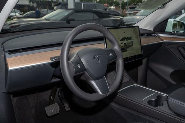 used 2023 Tesla Model Y car, priced at $33,194