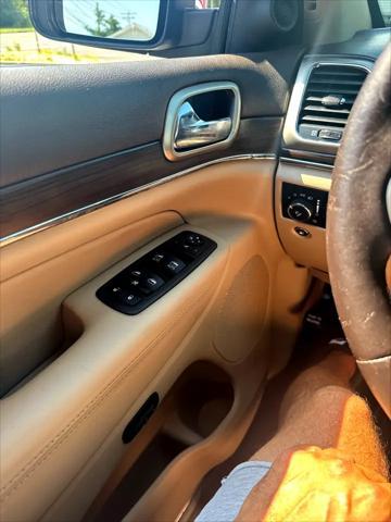 used 2015 Jeep Grand Cherokee car, priced at $10,999