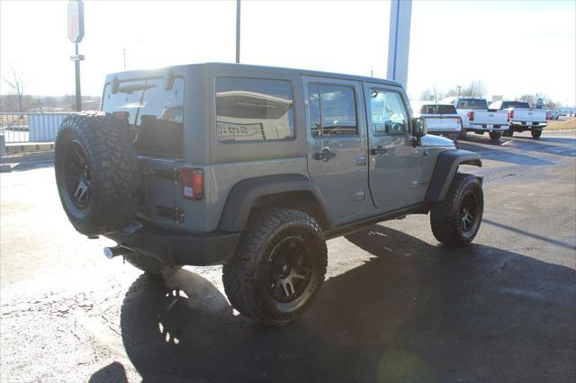 used 2014 Jeep Wrangler Unlimited car, priced at $17,600