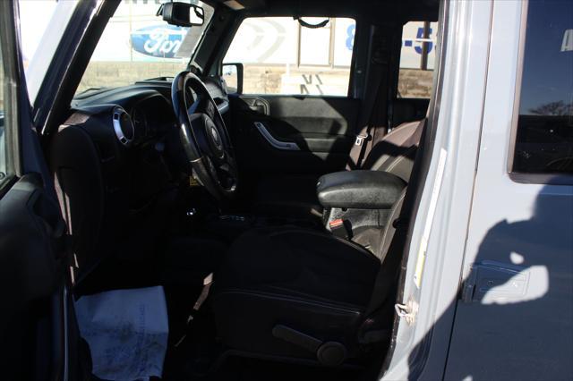 used 2014 Jeep Wrangler Unlimited car, priced at $17,600