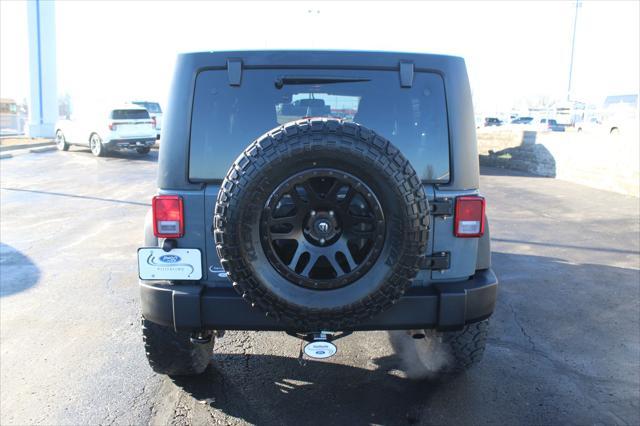 used 2014 Jeep Wrangler Unlimited car, priced at $17,600