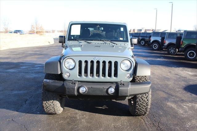 used 2014 Jeep Wrangler Unlimited car, priced at $17,600