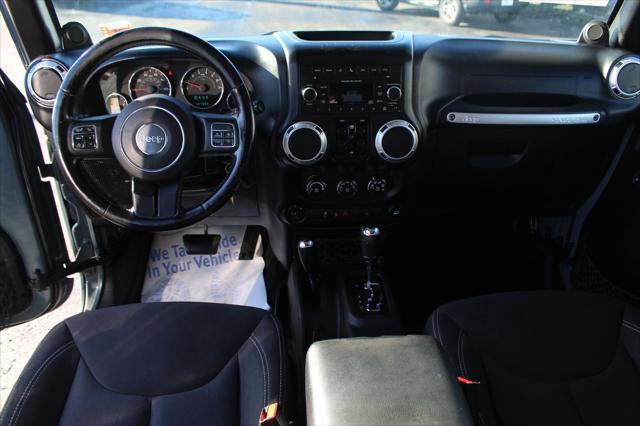 used 2014 Jeep Wrangler Unlimited car, priced at $17,600