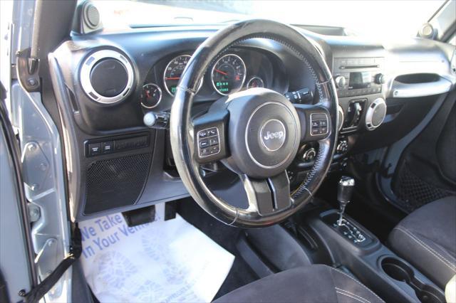 used 2014 Jeep Wrangler Unlimited car, priced at $17,600