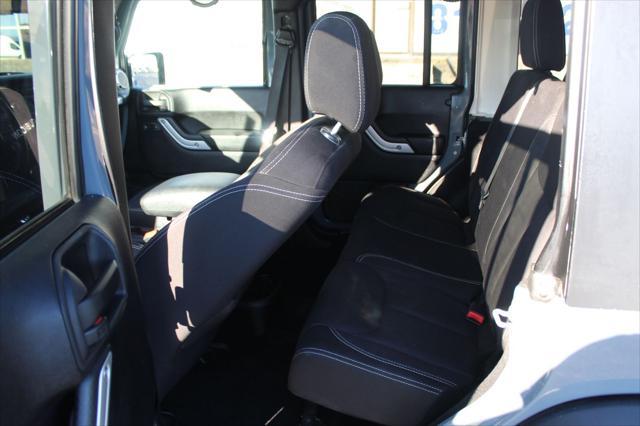 used 2014 Jeep Wrangler Unlimited car, priced at $17,600