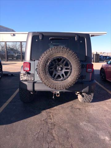 used 2014 Jeep Wrangler Unlimited car, priced at $18,995