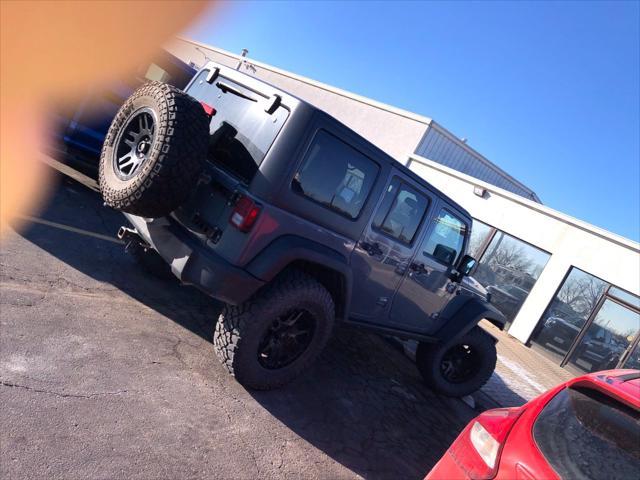 used 2014 Jeep Wrangler Unlimited car, priced at $18,995