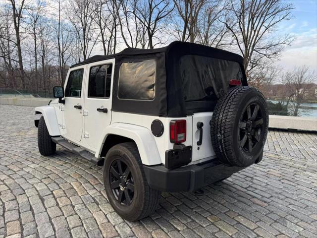 used 2014 Jeep Wrangler Unlimited car, priced at $17,995