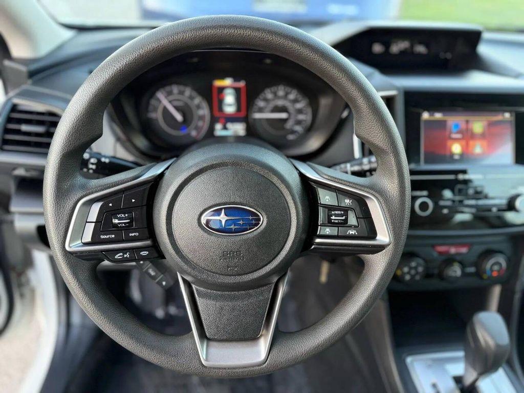 used 2023 Subaru Impreza car, priced at $14,995