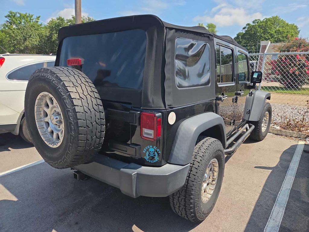 used 2018 Jeep Wrangler JK Unlimited car, priced at $19,999