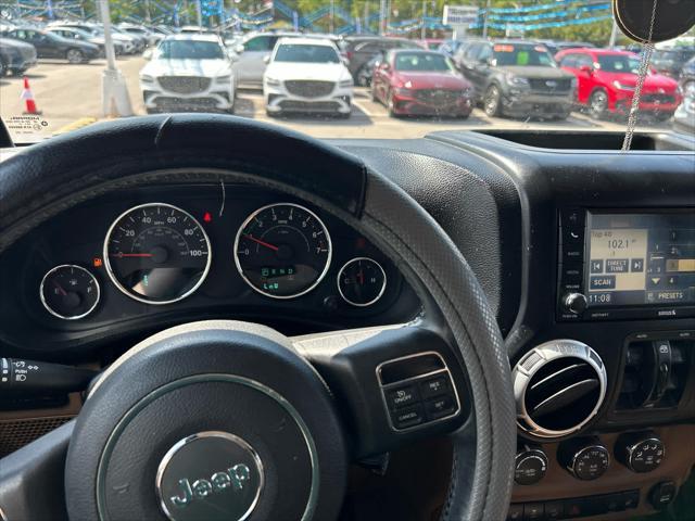 used 2012 Jeep Wrangler Unlimited car, priced at $17,999