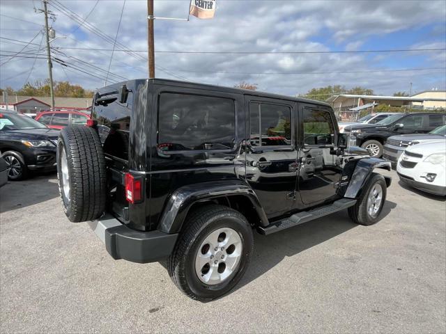 used 2014 Jeep Wrangler Unlimited car, priced at $16,731