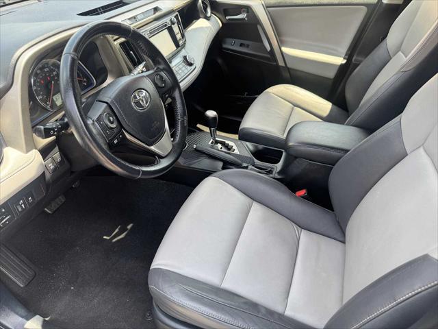 used 2014 Toyota RAV4 car, priced at $14,999