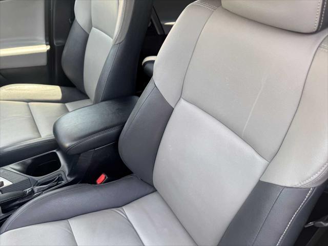 used 2014 Toyota RAV4 car, priced at $14,999
