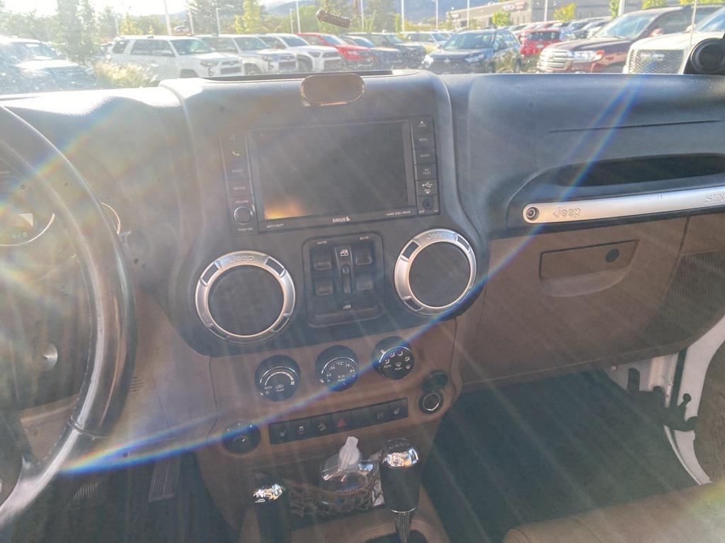 used 2012 Jeep Wrangler Unlimited car, priced at $16,900
