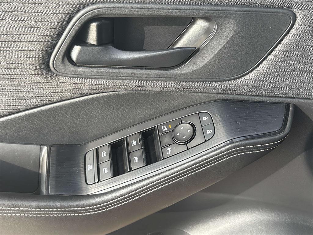 used 2021 Nissan Rogue car, priced at $15,000