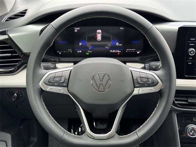 new 2025 Volkswagen Taos car, priced at $27,153