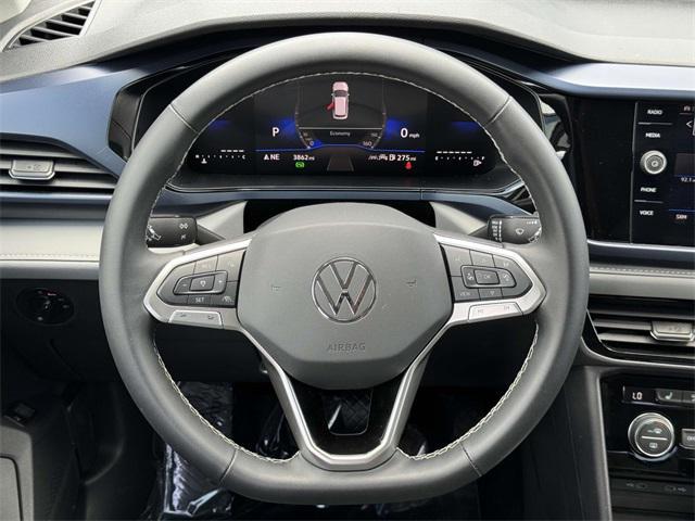 used 2024 Volkswagen Taos car, priced at $27,208