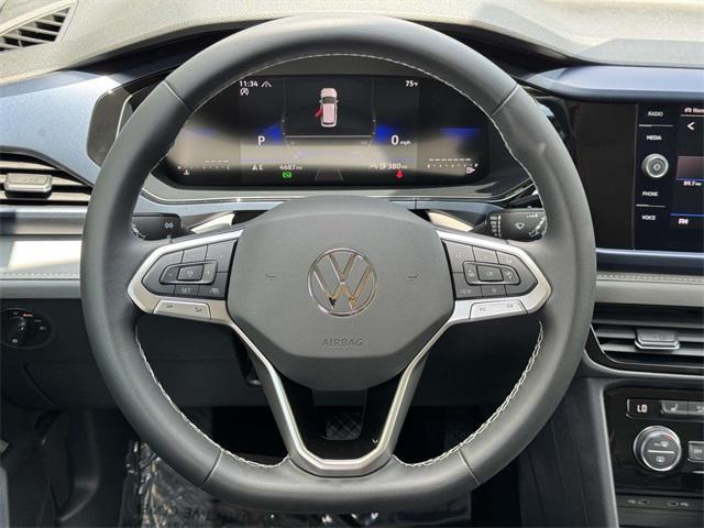 used 2024 Volkswagen Taos car, priced at $25,844