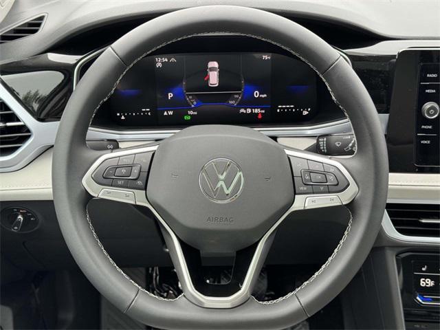 new 2025 Volkswagen Taos car, priced at $32,016