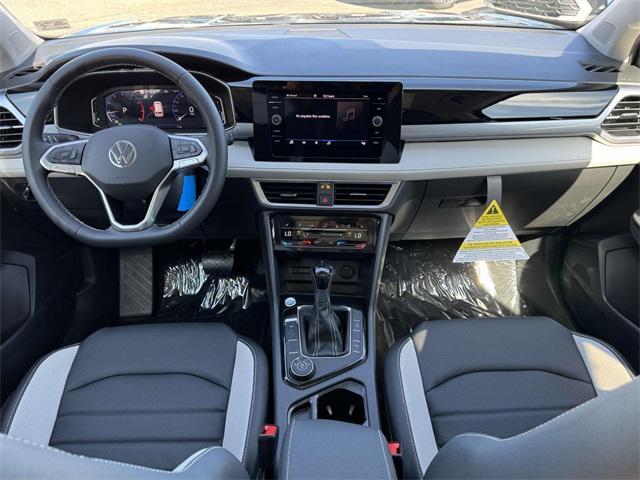 new 2025 Volkswagen Taos car, priced at $37,199