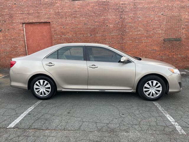 used 2014 Toyota Camry car, priced at $8,990