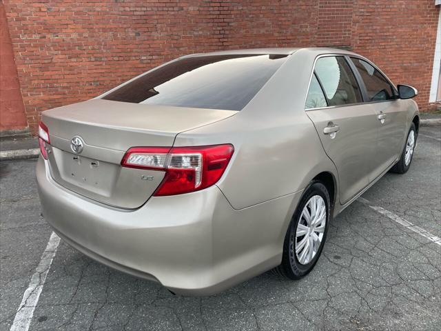 used 2014 Toyota Camry car, priced at $8,990