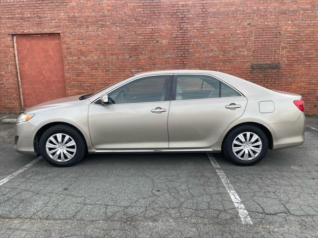 used 2014 Toyota Camry car, priced at $8,990