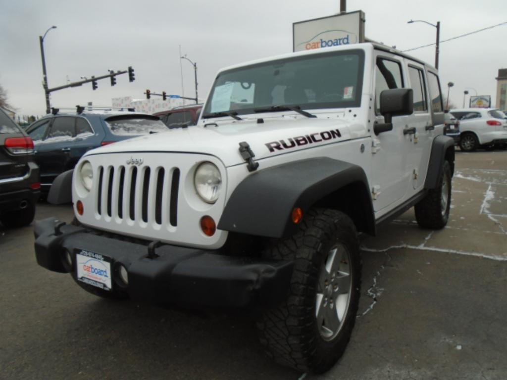 used 2011 Jeep Wrangler Unlimited car, priced at $16,997