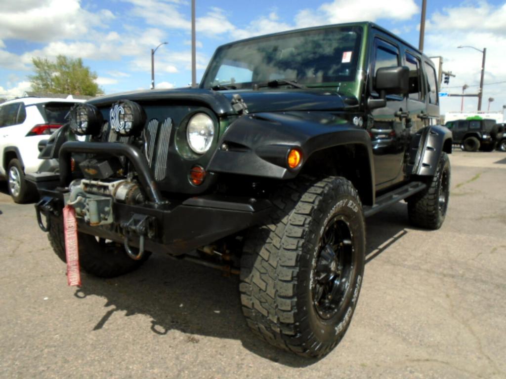 used 2011 Jeep Wrangler Unlimited car, priced at $15,997