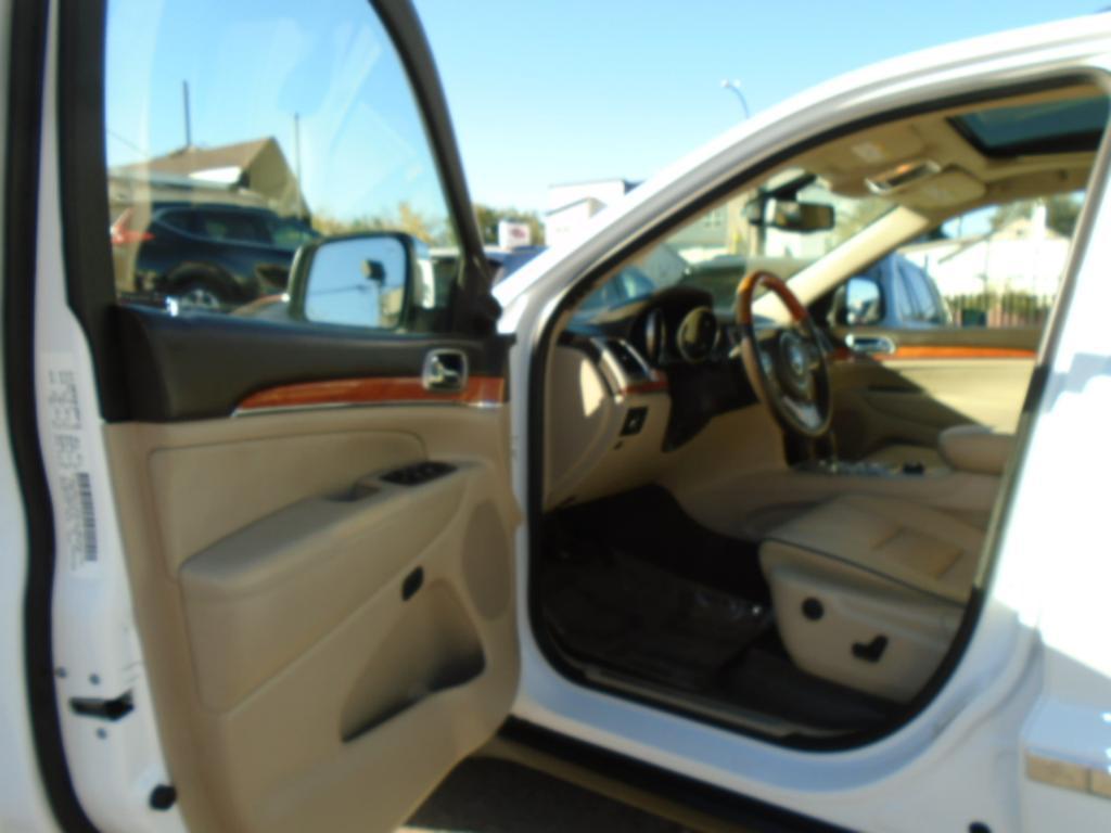 used 2013 Jeep Grand Cherokee car, priced at $14,497