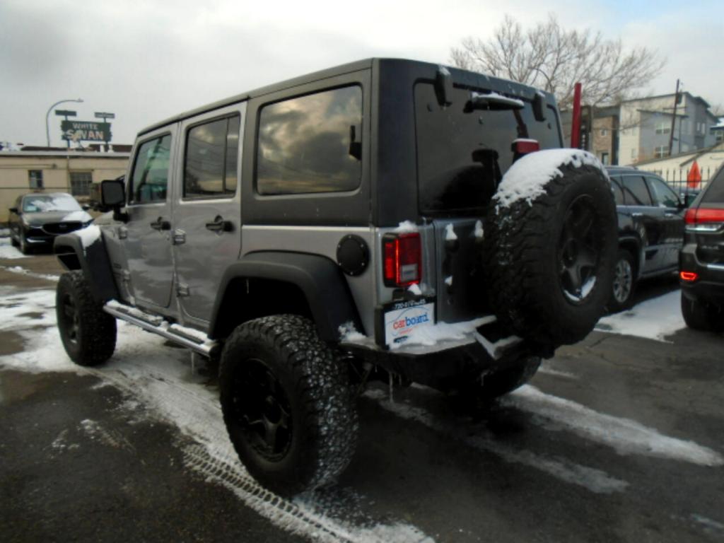 used 2018 Jeep Wrangler JK Unlimited car, priced at $16,990