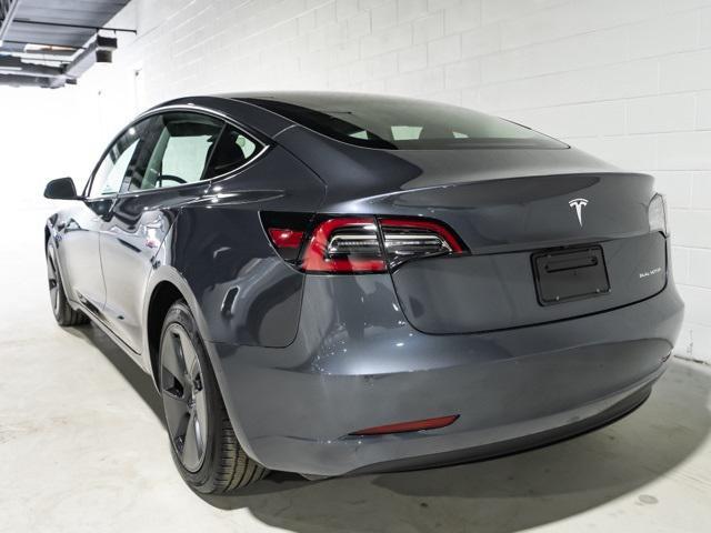 used 2022 Tesla Model 3 car, priced at $27,995