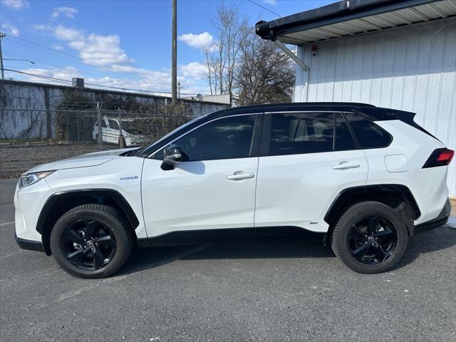 used 2021 Toyota RAV4 Hybrid car, priced at $27,495