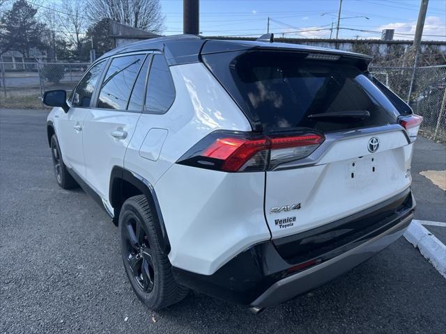 used 2021 Toyota RAV4 Hybrid car, priced at $27,495