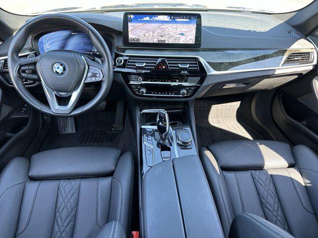 used 2023 BMW 530e car, priced at $60,930