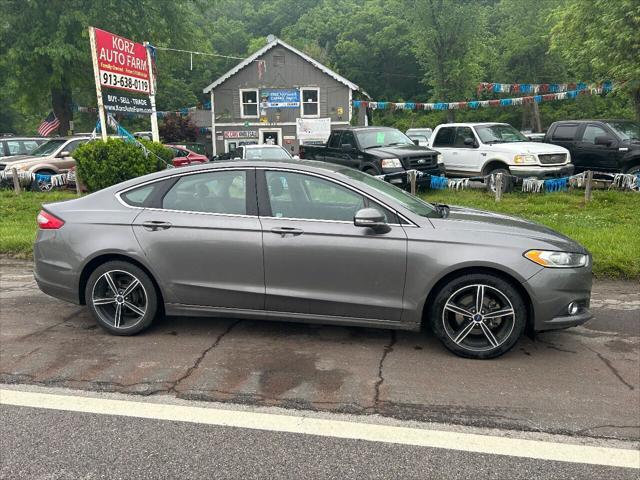 used 2013 Ford Fusion car, priced at $6,955