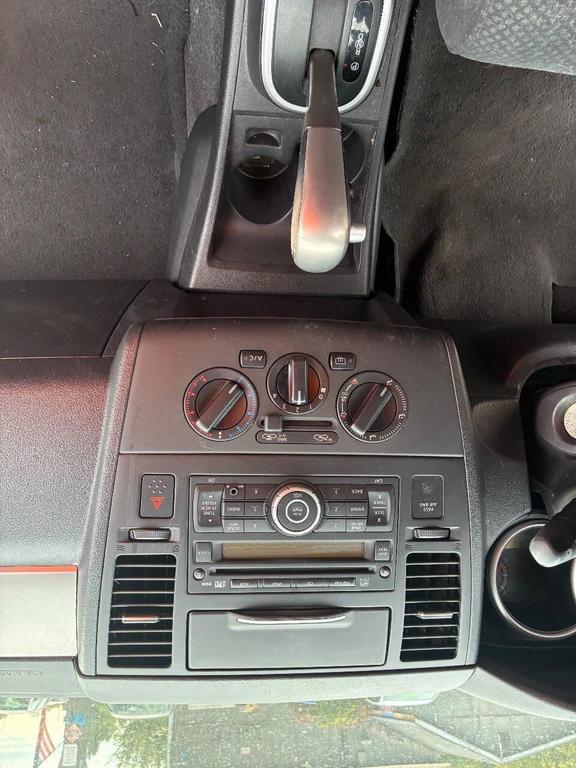 used 2012 Nissan Versa car, priced at $5,950