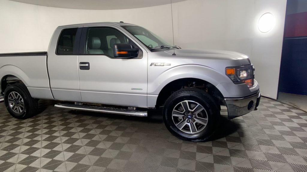used 2014 Ford F-150 car, priced at $13,500