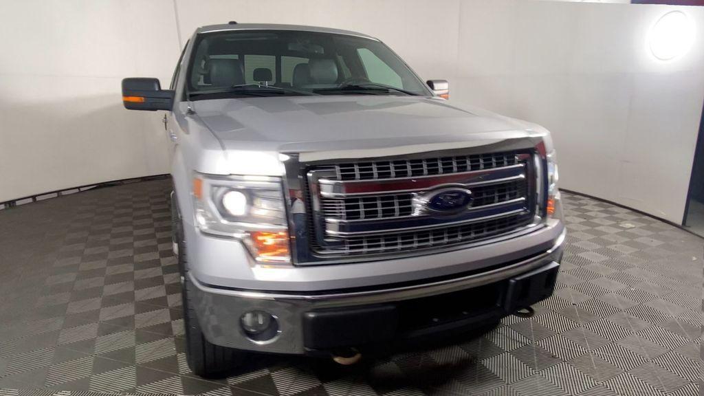 used 2014 Ford F-150 car, priced at $13,500