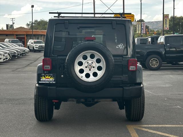 used 2012 Jeep Wrangler Unlimited car, priced at $14,998