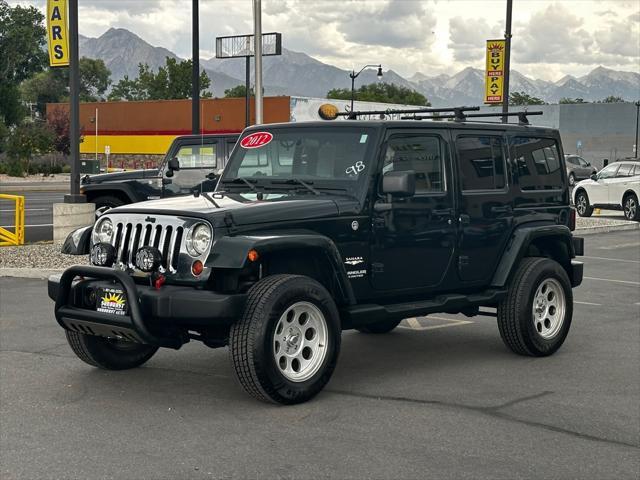 used 2012 Jeep Wrangler Unlimited car, priced at $14,998