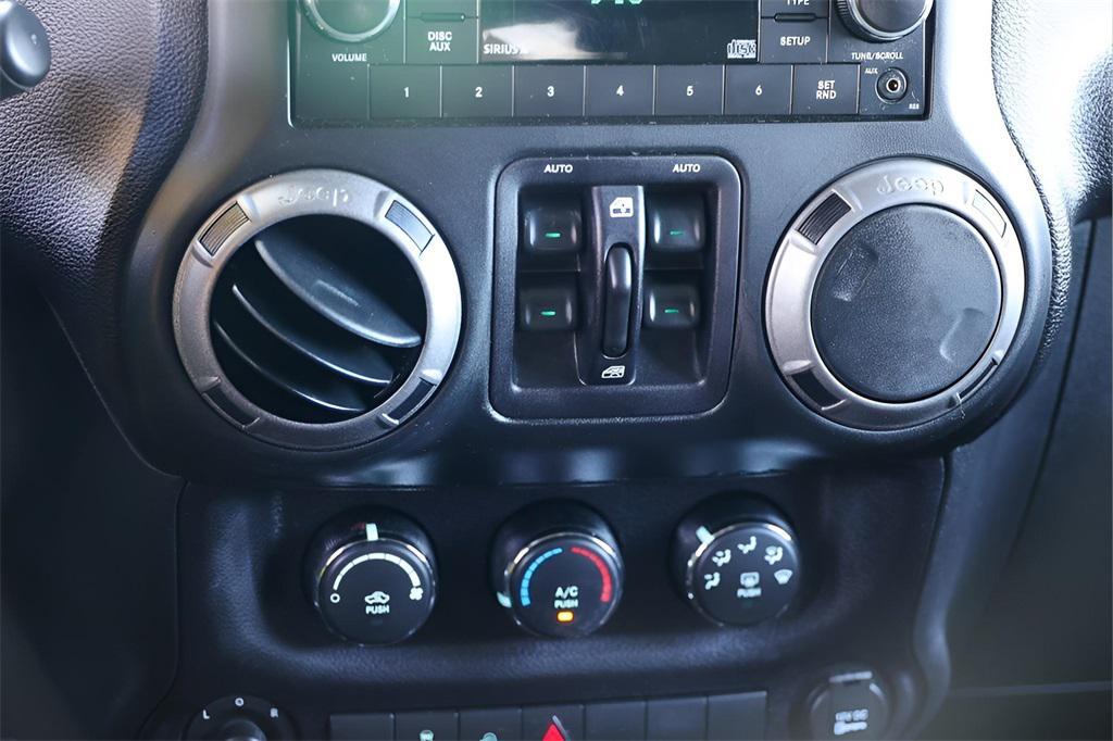 used 2016 Jeep Wrangler Unlimited car, priced at $17,649