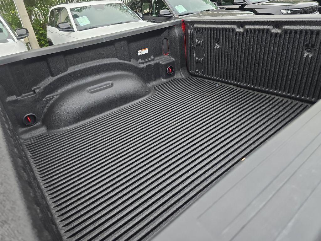 used 2021 Ram 1500 car, priced at $26,990