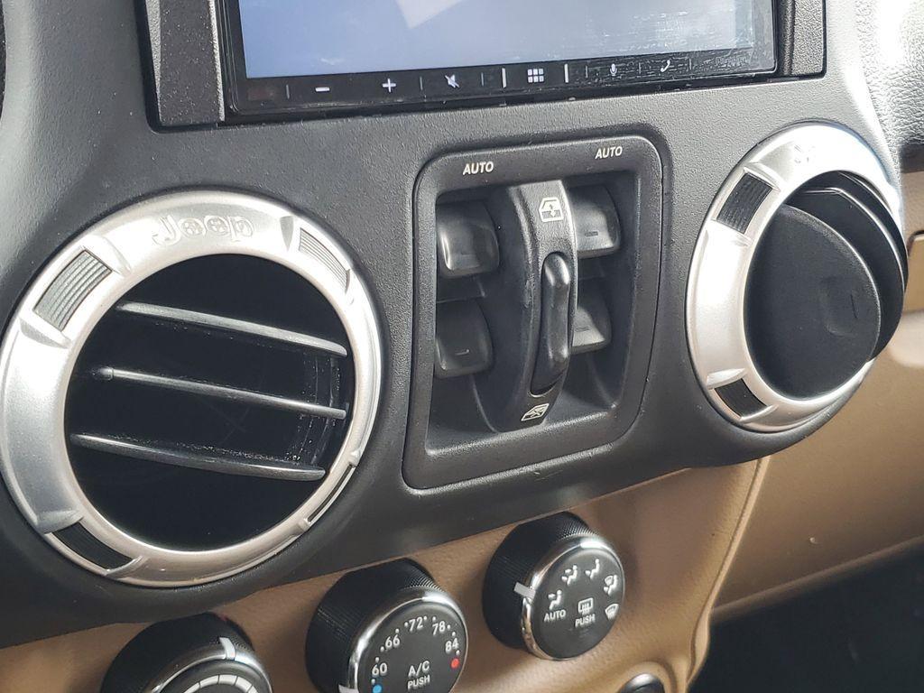 used 2015 Jeep Wrangler Unlimited car, priced at $16,690