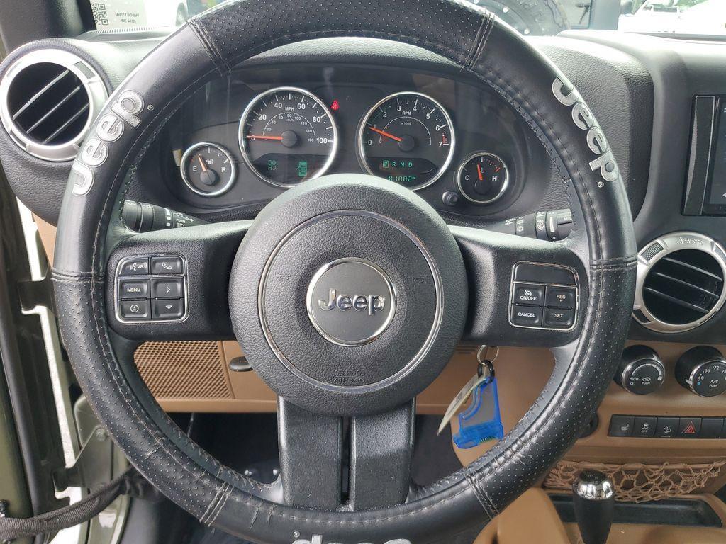 used 2015 Jeep Wrangler Unlimited car, priced at $16,690